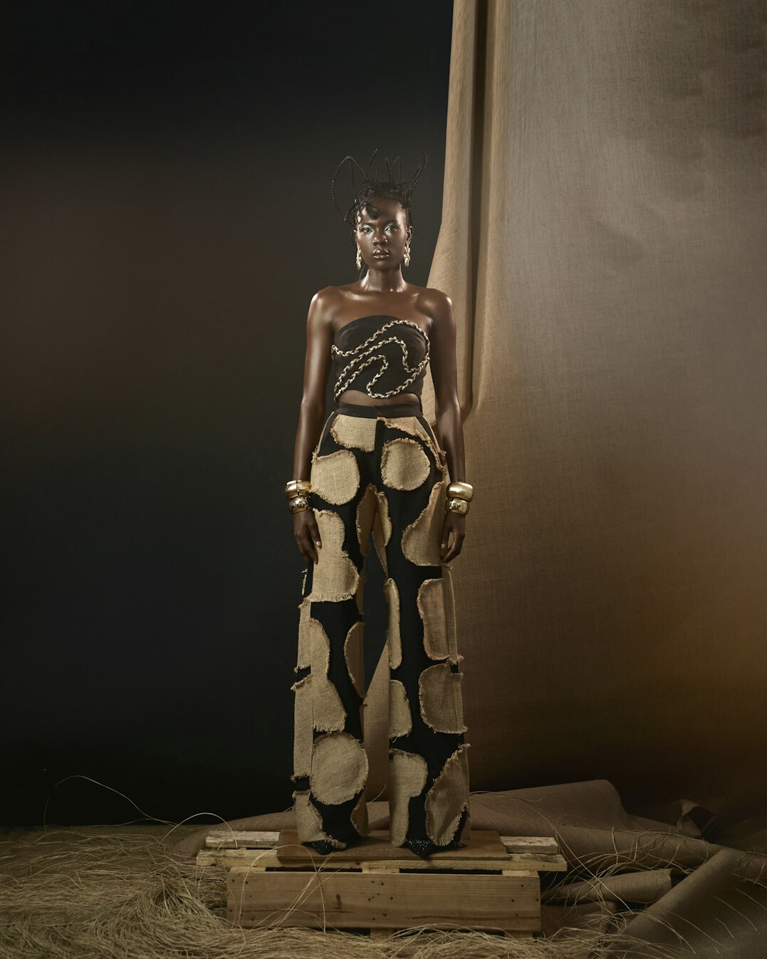 Fashion model walking down a runway during a designer show