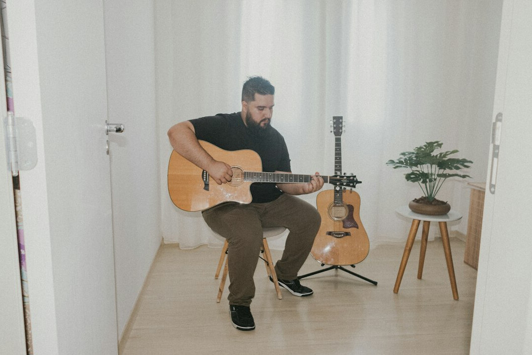 musician playing guitar